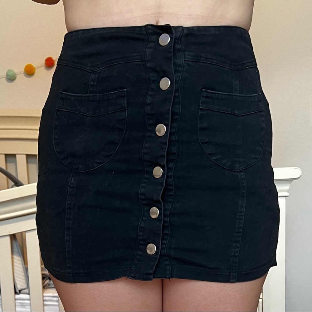 A little small on me but button up mini skirt